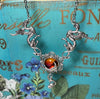 Moon Over Avalon necklace — Arcane Angel, winged mythical creatures and moon pendant